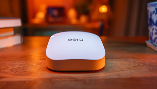 An eero device on top of a coffee table.